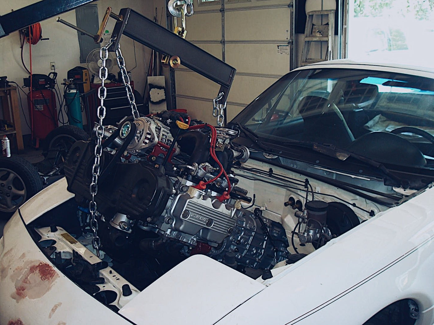 Subaru ej20 2.0l engine being swapped.